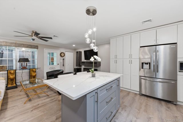 200 NewCastle Court E, Ridge, NY 11961