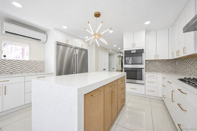76-37 Vleigh Place, Kew Garden Hills, NY 11367