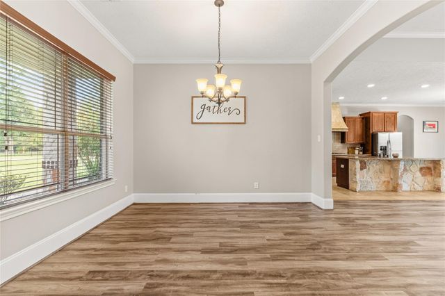 818 Commons Lake Edge Drive, Huffman, TX 77336