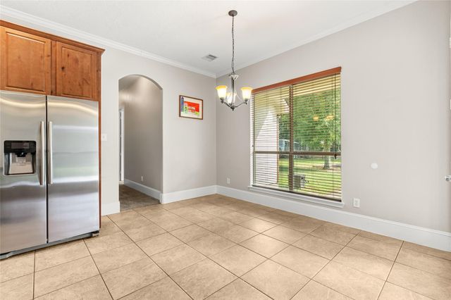 818 Commons Lake Edge Drive, Huffman, TX 77336