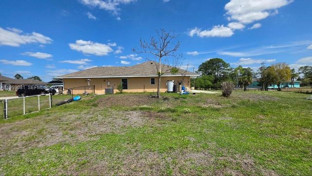 825 Costa Pl, Lehigh Acres, FL 33972