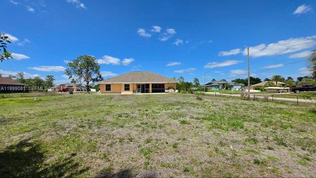 825 Costa Pl, Lehigh Acres, FL 33972