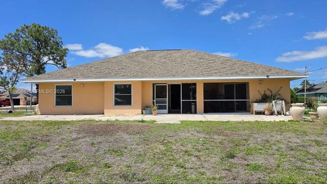 825 Costa Pl, Lehigh Acres, FL 33972