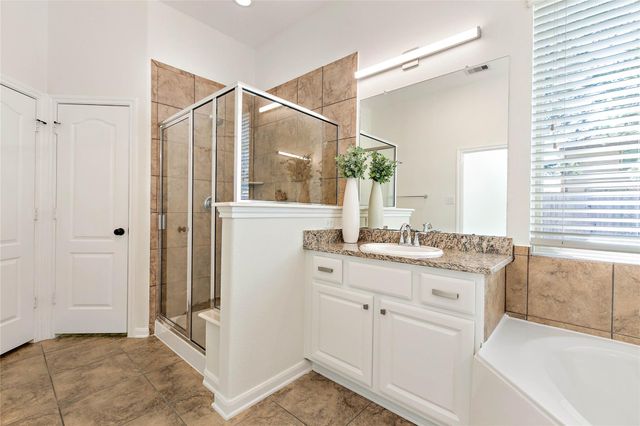 35 E Wolf Cabin Circle, Spring, TX 77389