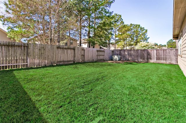 35 E Wolf Cabin Circle, Spring, TX 77389