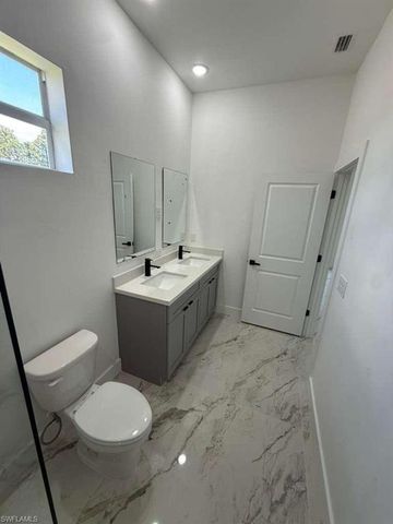 908 Winters ST E, Lehigh Acres, FL 33974