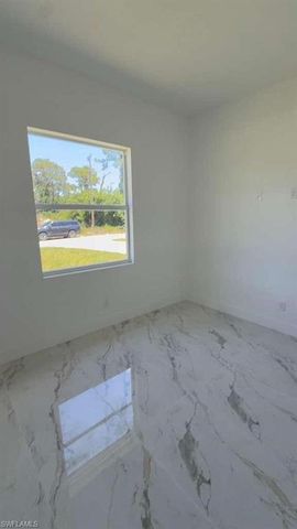 908 Winters ST E, Lehigh Acres, FL 33974
