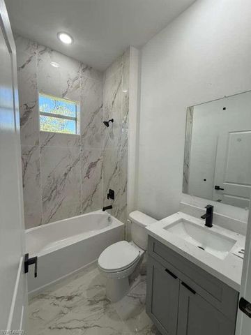 908 Winters ST E, Lehigh Acres, FL 33974