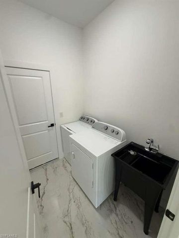 908 Winters ST E, Lehigh Acres, FL 33974