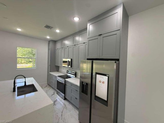 908 Winters ST E, Lehigh Acres, FL 33974