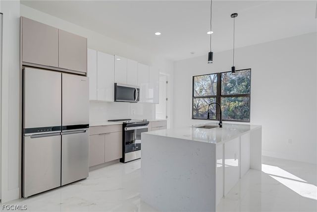 1827 Tomaso AVE, Lehigh Acres, FL 33972