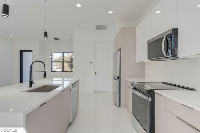 1827 Tomaso AVE, Lehigh Acres, FL 33972