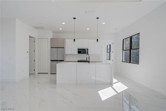 1827 Tomaso AVE, Lehigh Acres, FL 33972