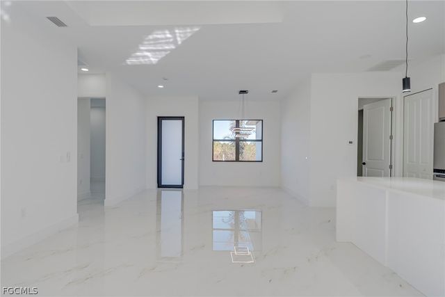 1827 Tomaso AVE, Lehigh Acres, FL 33972