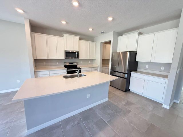 7724 BROAD RIVER AVENUE, Land O Lakes, FL 34638