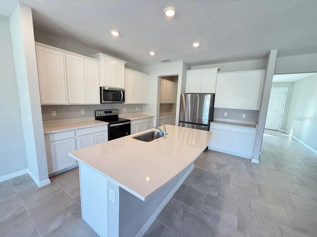 7724 BROAD RIVER AVENUE, Land O Lakes, FL 34638