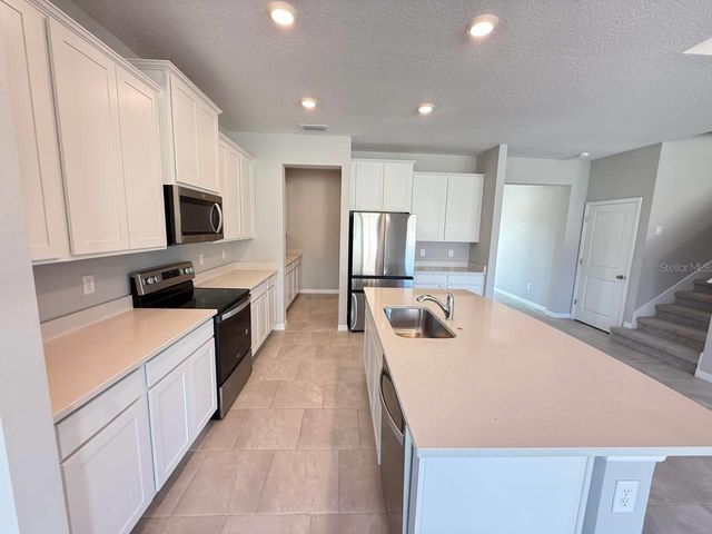 7724 BROAD RIVER AVENUE, Land O Lakes, FL 34638