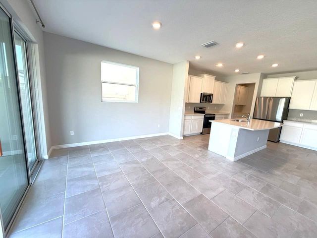 7724 BROAD RIVER AVENUE, Land O Lakes, FL 34638