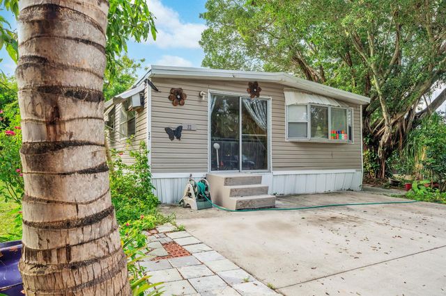 32 Lisa Lane, Greenacres, FL 33463