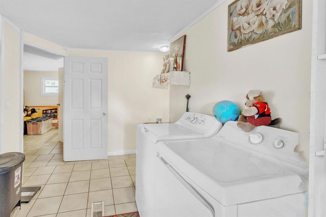 32 Lisa Lane, Greenacres, FL 33463