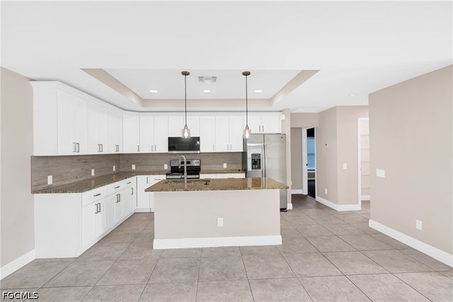 606 Morningmist LN, Lehigh Acres, FL 33974