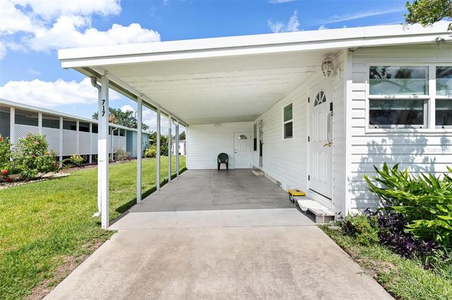 717 W COACH N FOUR DRIVE, Leesburg, FL 34748