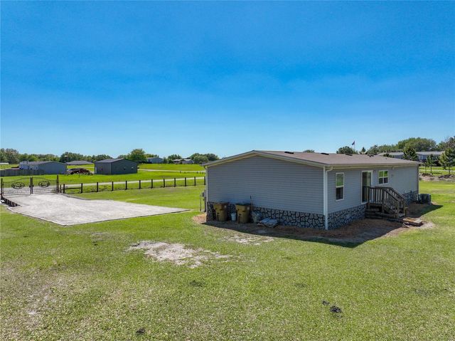 8507 STRAWBERRY FIELDS COURT, Howey In The Hills, FL 34737
