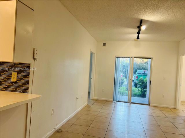 3221 Sabal Palm Mnr 103, Davie, FL 33024