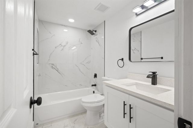 9402 W CLUSTER AVENUE, Tampa, FL 33615