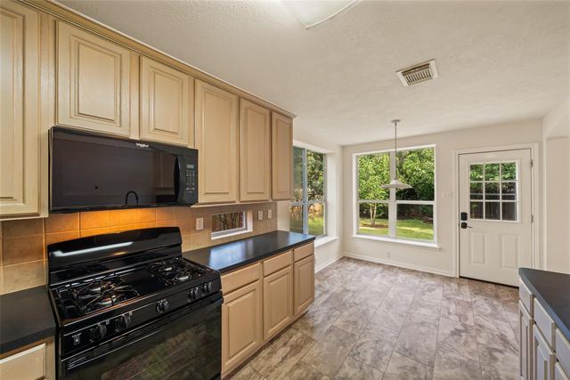 10 Orchid Grove Place, The Woodlands, TX 77385