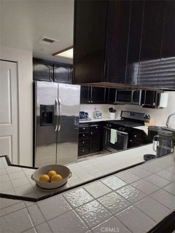 4591 Warner Avenue 203, Huntington Beach, CA 92649