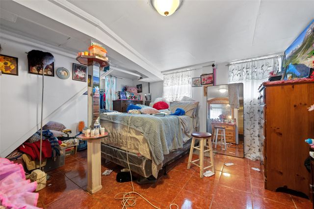 3129 100th Street, East Elmhurst, NY 11369