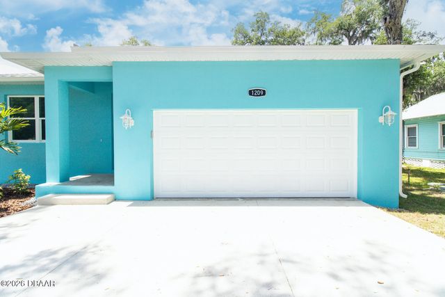 1209 Palmetto Street, New Smyrna Beach, FL 32168