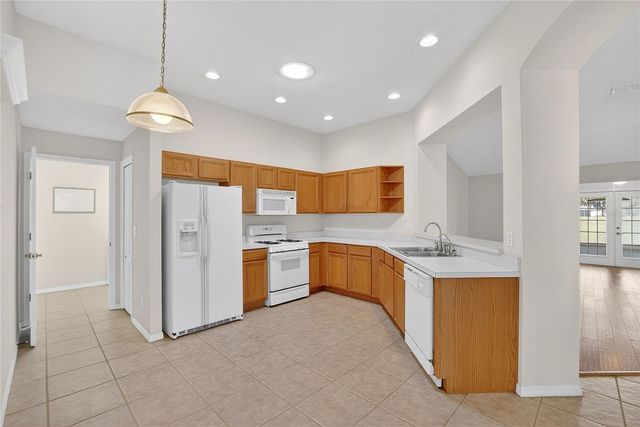 1148 CORINTH GREENS DRIVE 12, Sun City Center, FL 33573