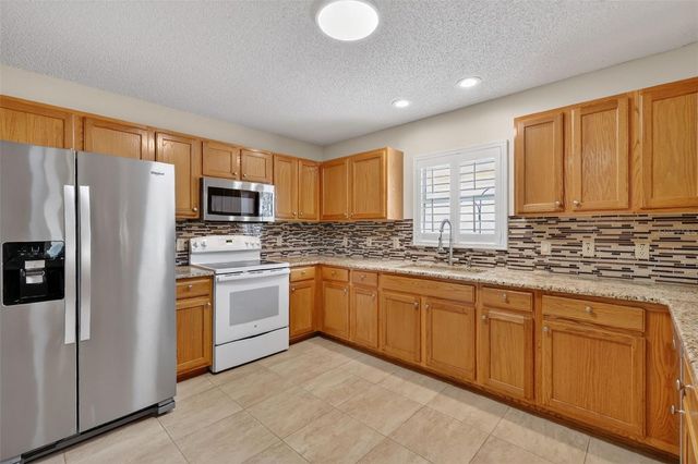 1410 ALMANZA DRIVE, The Villages, FL 32159