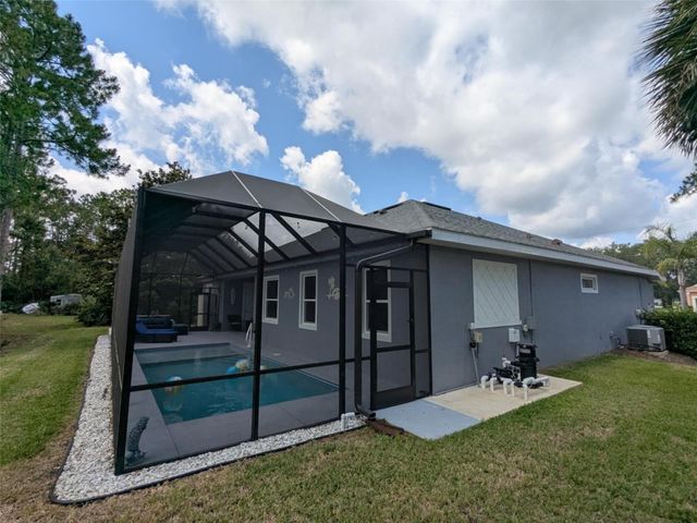 52 BUD HOLLOW DRIVE, Palm Coast, FL 32137