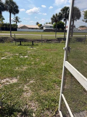 9448 Saddlebrook Drive, Boca Raton, FL 33496