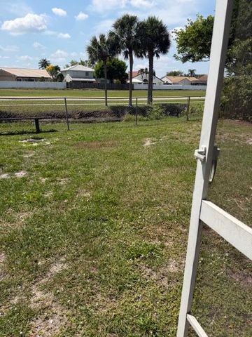 9448 Saddlebrook Drive, Boca Raton, FL 33496