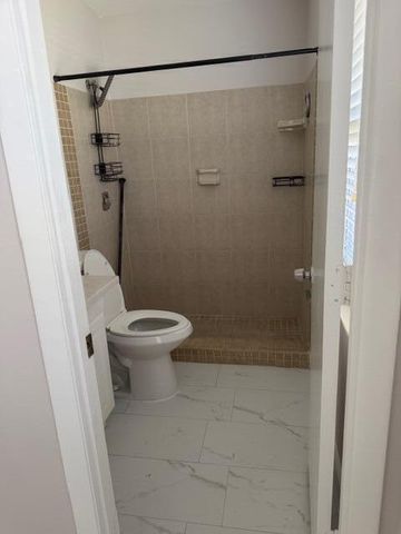 9448 Saddlebrook Drive, Boca Raton, FL 33496