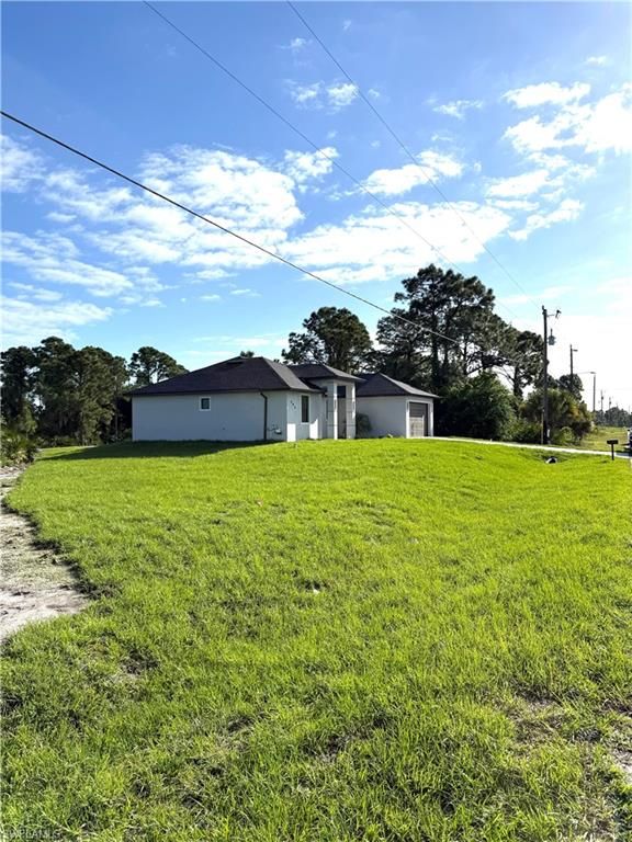 803 Newell ST E, LEHIGH ACRES, FL 33974 — photo 2