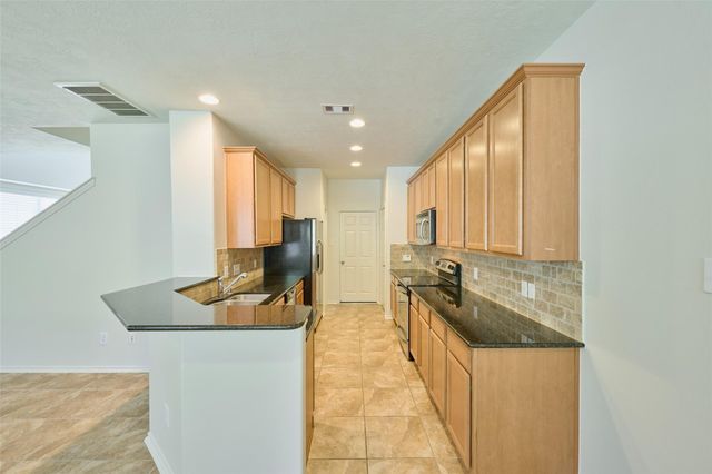 327 Bloomhill Place, Magnolia, TX 77354