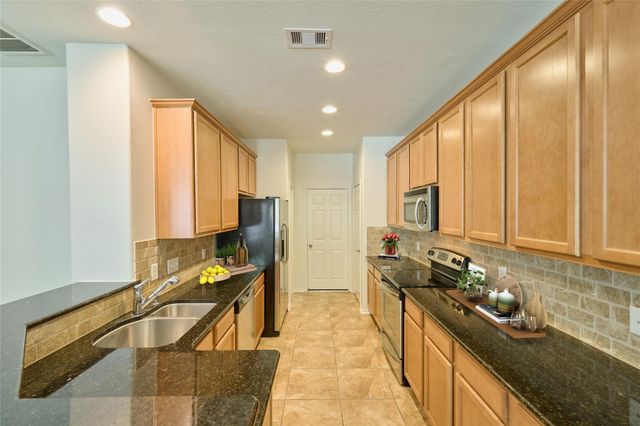 327 Bloomhill Place, Magnolia, TX 77354