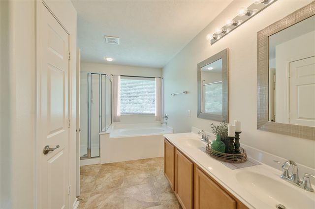 327 Bloomhill Place, Magnolia, TX 77354