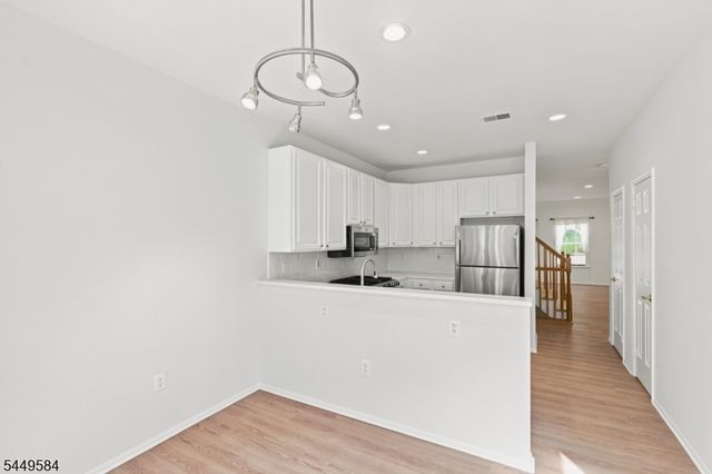 47 Lambiance Ct, Highland Park Boro, NJ 08904