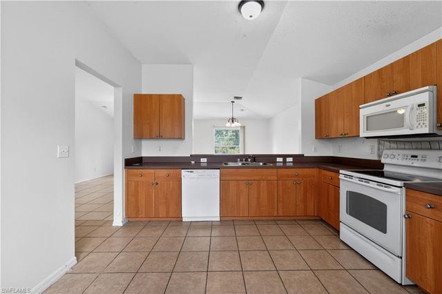 446 Windermere DR, Lehigh Acres, FL 33972