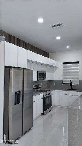 1414 Jefferson AVE, Lehigh Acres, FL 33972