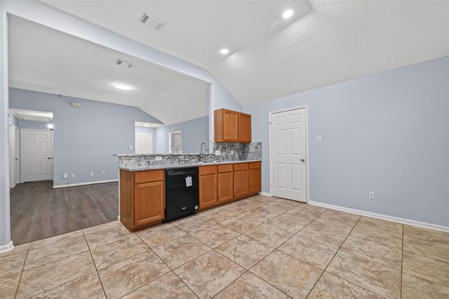 14089 Broken Arrow Drive, Willis, TX 77378