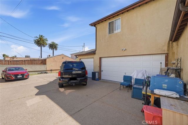 - 1411 W 84th Place, Los Angeles, CA 90047