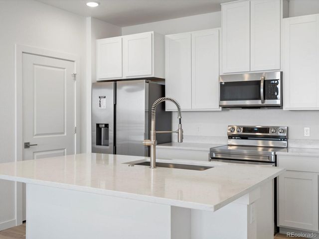 6153 N Ceylon Street 302, Denver, CO 80239