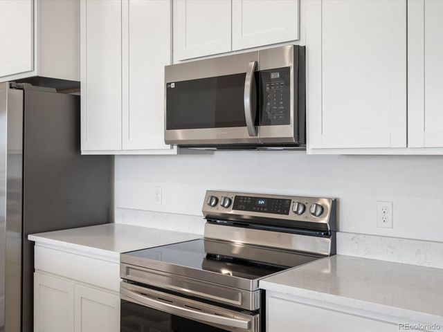 6153 N Ceylon Street 302, Denver, CO 80239